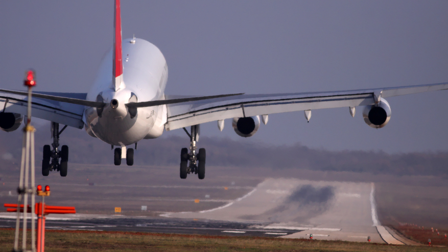 Commercial airline landing on runway