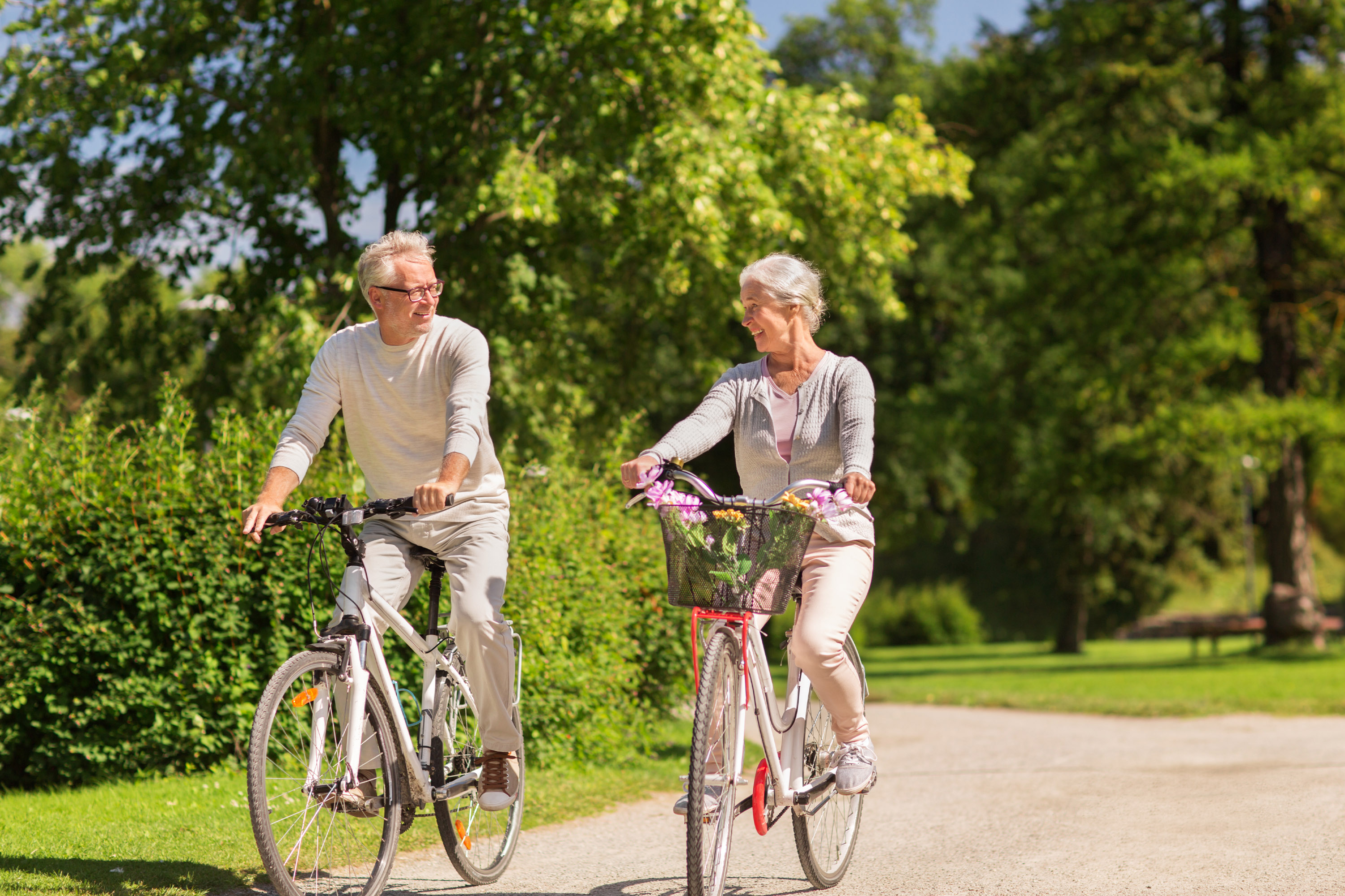 Couple enjoying retirement outdoors, representing financial planning and future goals