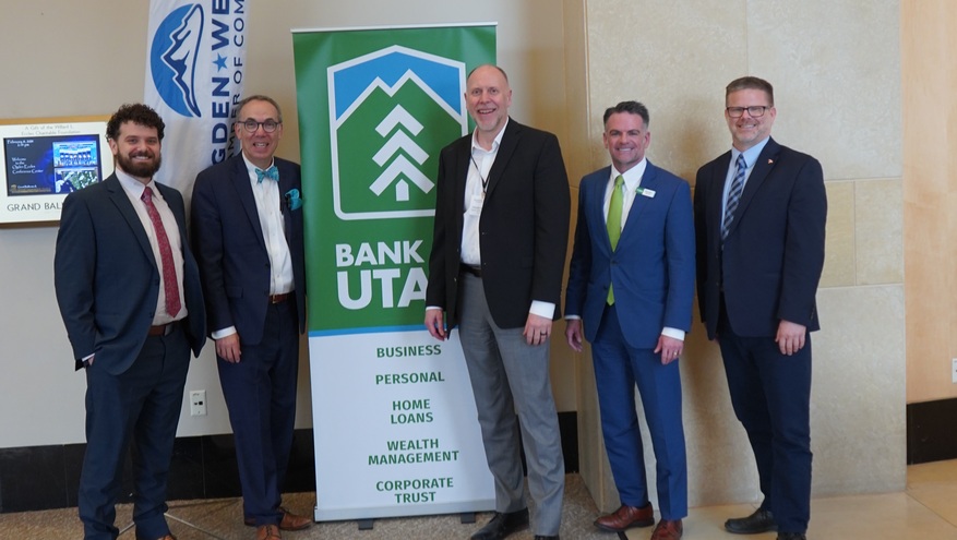 Speakers from Bank of Utah's Economic Forecast pose for a picture prior to the event