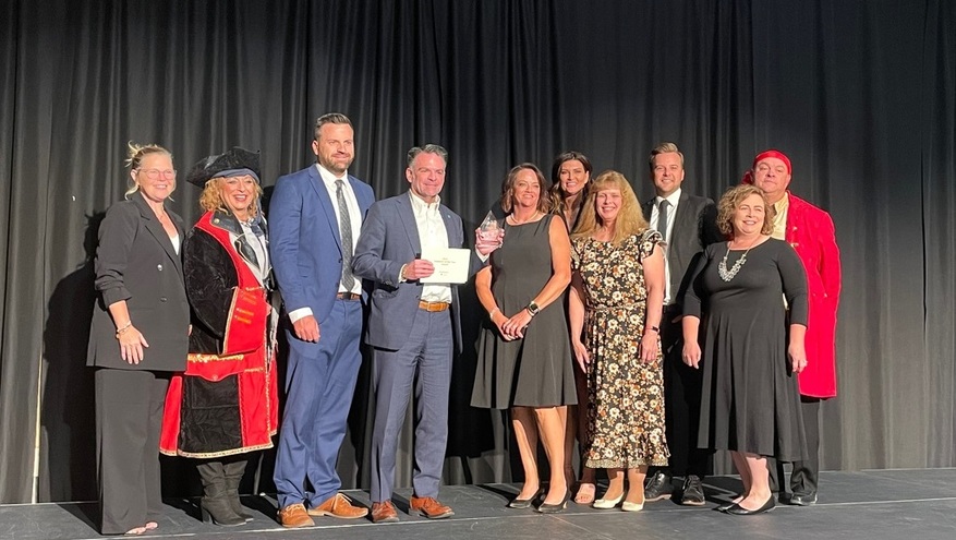 Bank of Utah team members are photographed after accepting the Davis Chamber of Commerce Employer of the Year award for 2024.
