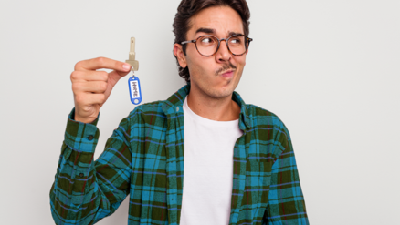 young guy with keys