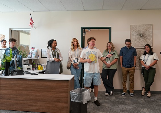 Students leading visitors through a Teen Center