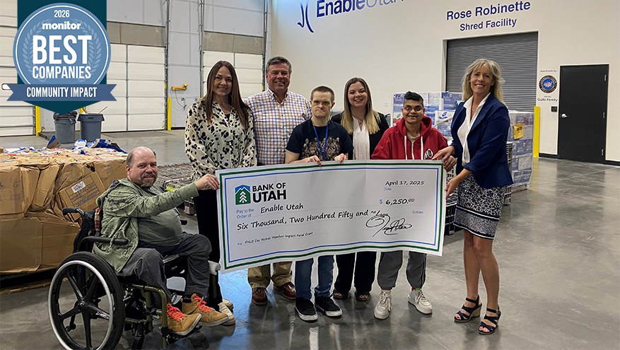 Bank of Utah team members presenting a $6,250 donation check to Enable Utah representatives, featuring the Monitor 2026 Best Companies Community Impact badge in the corner.