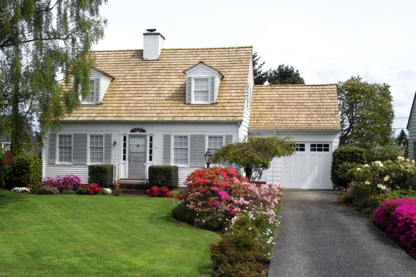 House with porch and greenery