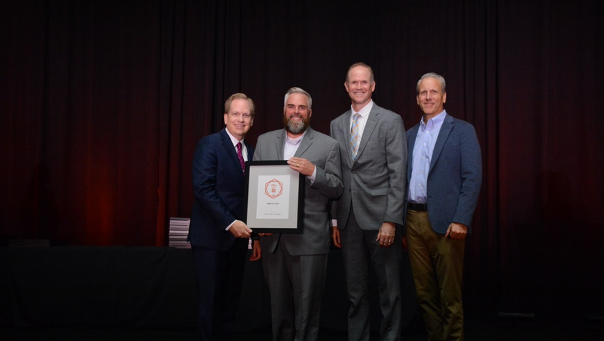 Bank of Utah team members accepting the 2026 Utah Business Fast 50 award on stage.
