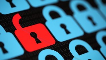 Image of rows of blue digital padlocks with one red unlocked padlock, with ones and zeros in background.