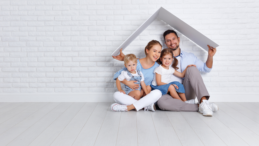 Happy family under roof