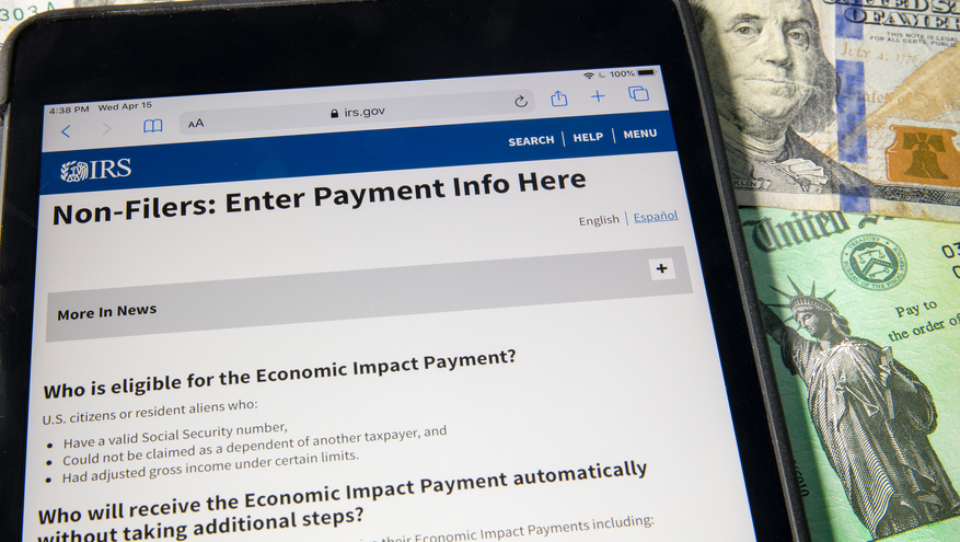 Photo of the IRS website on a mobile device checking the status of a stimulus payment
